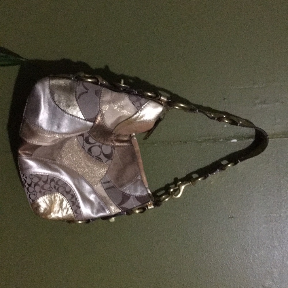 Coach gold tone purse
